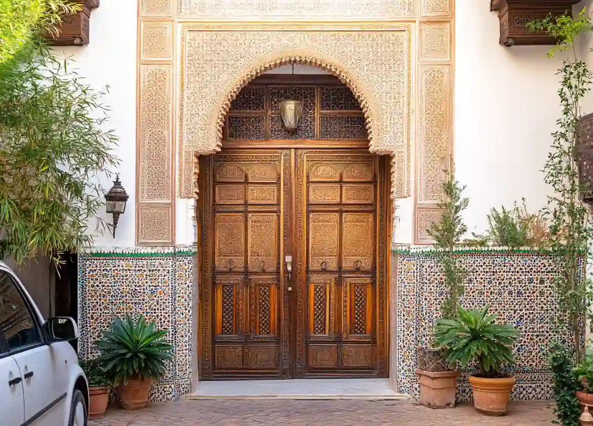 Car rental riad delivery in Fes Medina Morocco near a traditional riad entrance